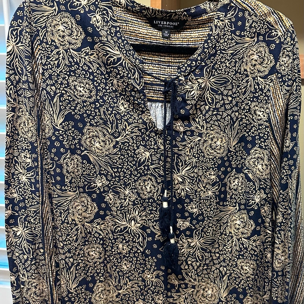 Liverpool top.  Size Med.  Look great casual and can dress up.